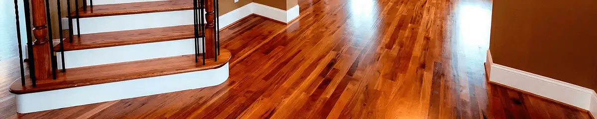 Base floor of a staircase with professionally restored wood flooring in Tucson AZ