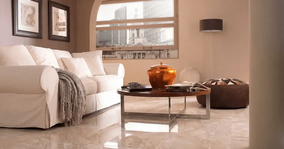 Modern living room with professionally installed marble flooring, a beige sofa, coffee table in Tucson, AZ
