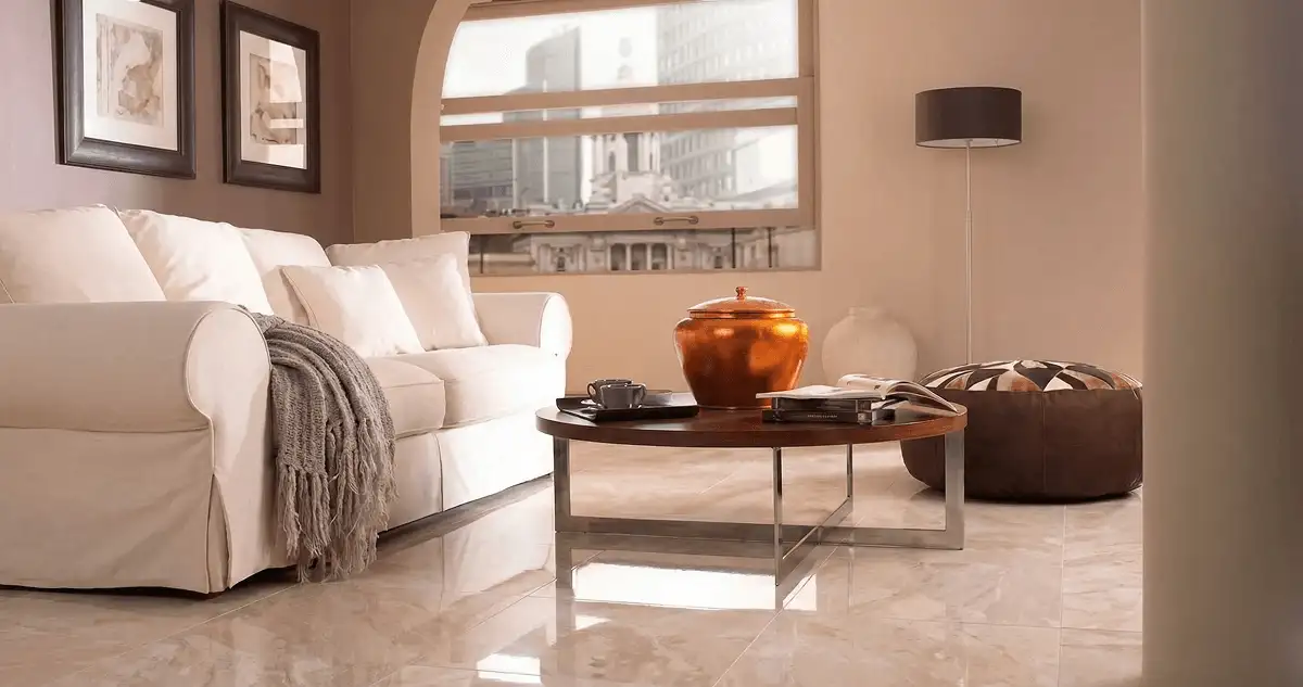 Modern living room with professionally installed marble flooring, a beige sofa, coffee table in Tucson, AZ