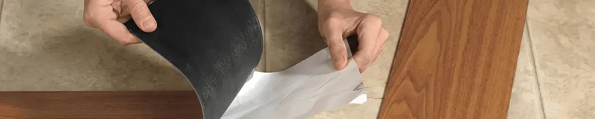 A professional installing vinyl flooring in Tucson, AZ