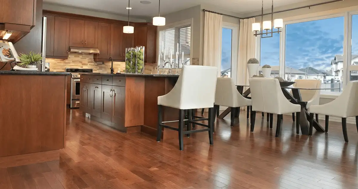 A modern kitchen with professionally installed wood flooring in Tucson, AZ